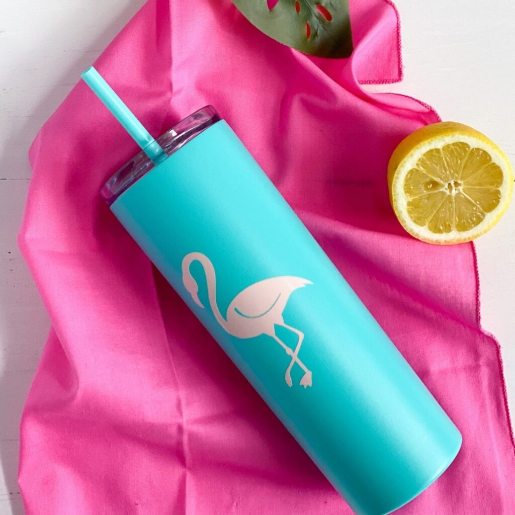 teal tumbler with pink flamingo decal