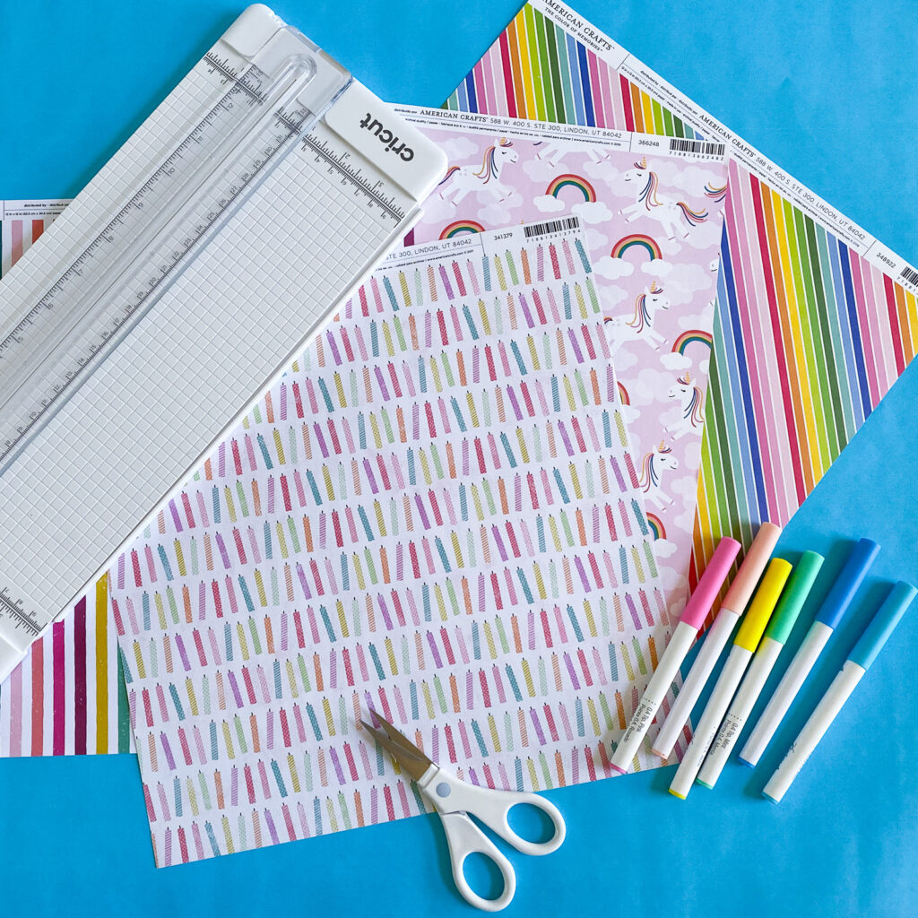 colorful scrapbook paper and scissors