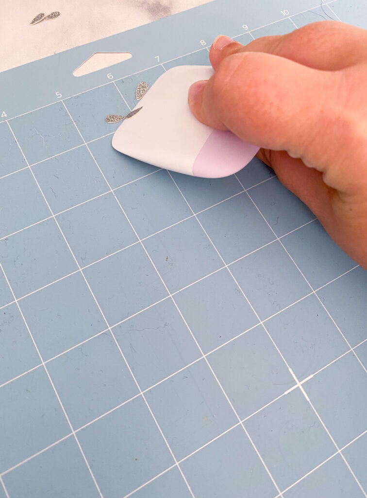 removing weeded paper from cricut mat