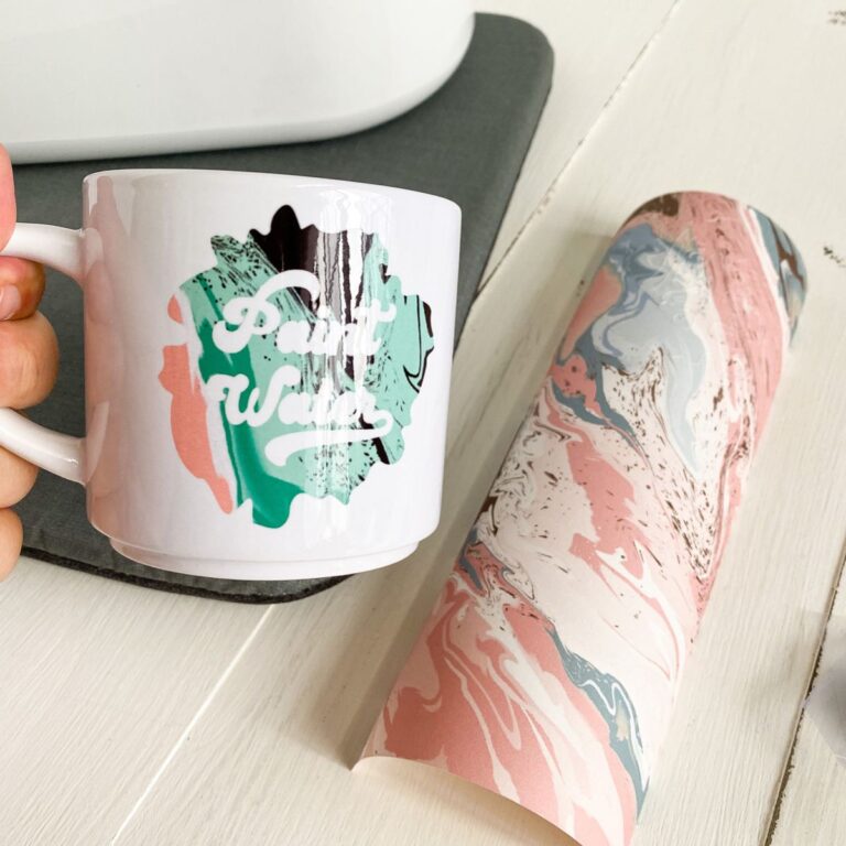 marbled infusible ink sheet and mug that says paint water