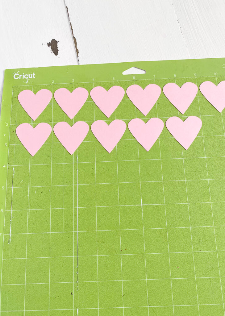 pink hearts cut on Cricut mat