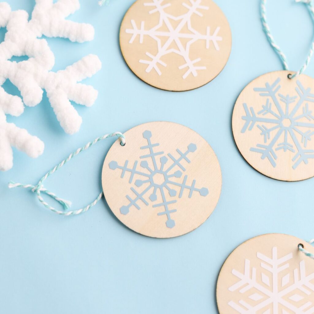 vinyl snowflake decals on wood ornaments