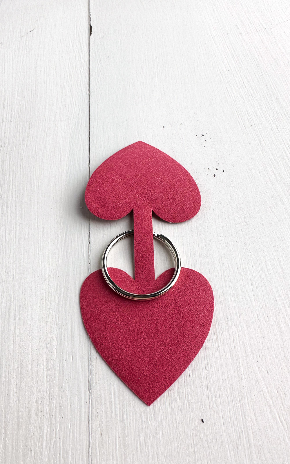heart shape cut from faux leather with keychain