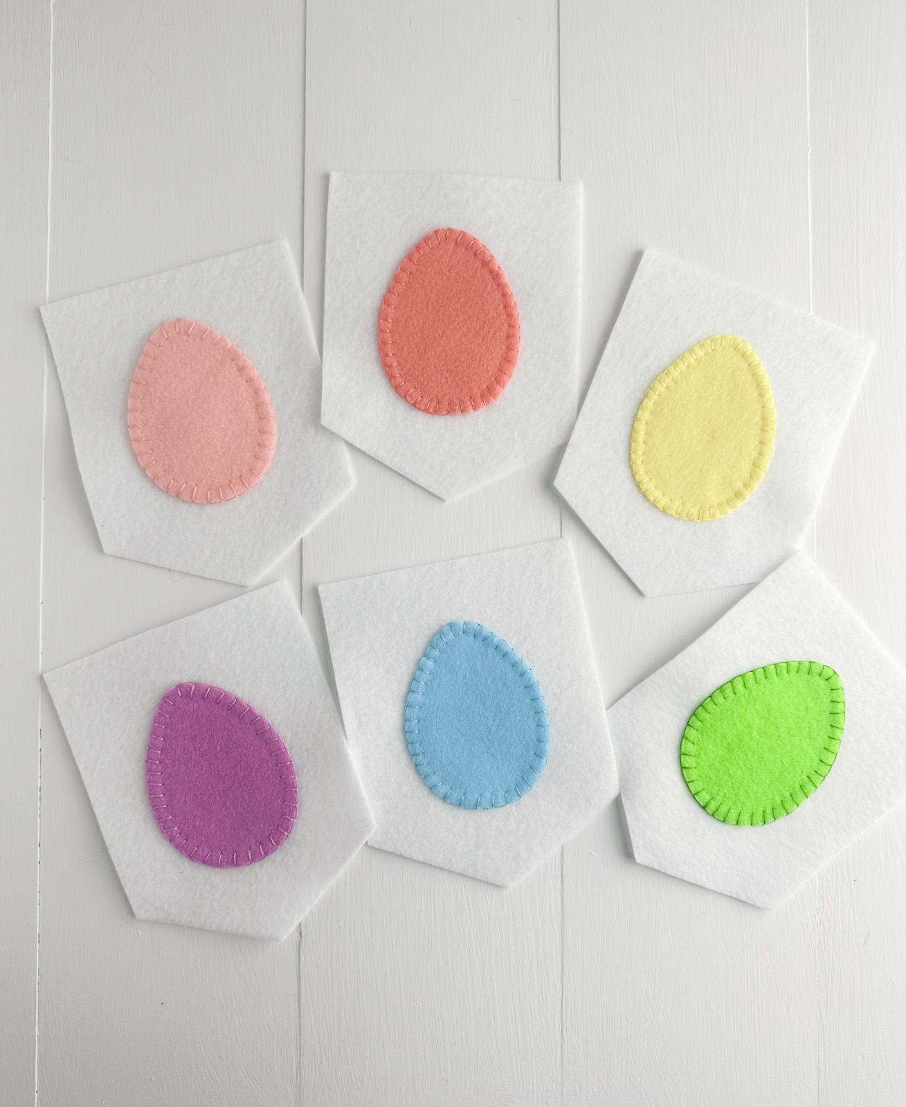 felt eggs embroidered to felt pieces